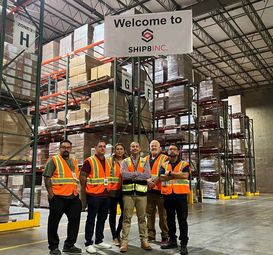 Fulfillment team in warehouse with orange safety vest by tiktok shop fulfillment product storage